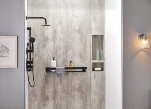 Close-up of a walk-in shower with black fixtures