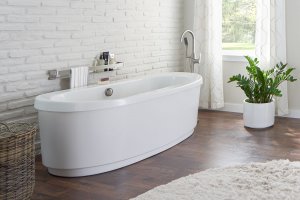 A white tub in a beautiful bathroom